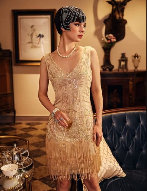 Old fashioned dresses with fancy beads and a vintage look