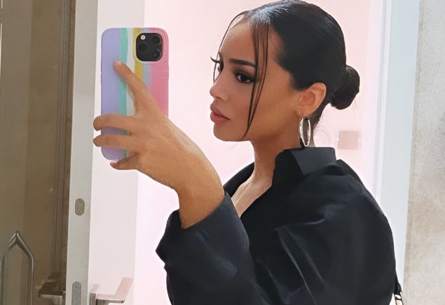 Low Slick Bun with Clean Parting and Polished Shine