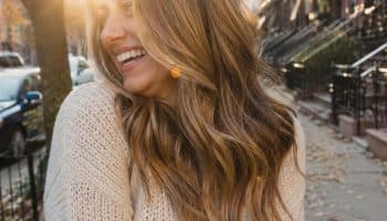 Low maintenance fall hair colors caramel bronde balayage in golden autumn light