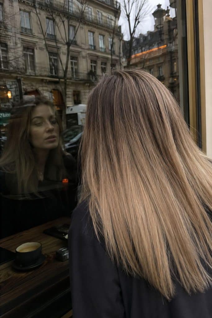 Mushroom bronde melt fall hair color with ashy root melt