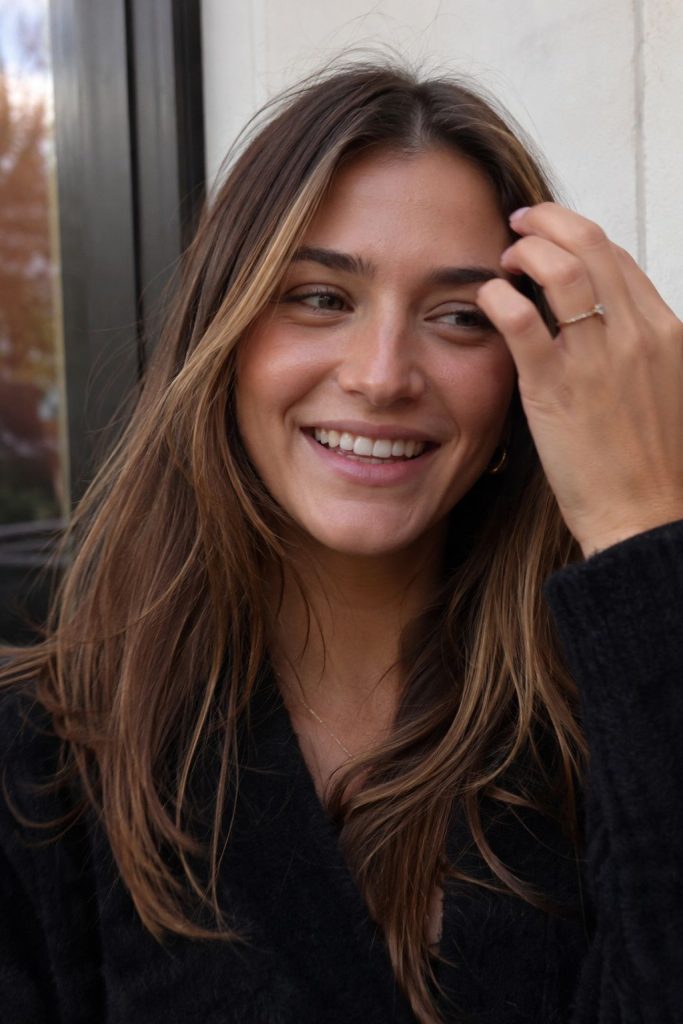 Chestnut brown hair with face-framing highlights fall color